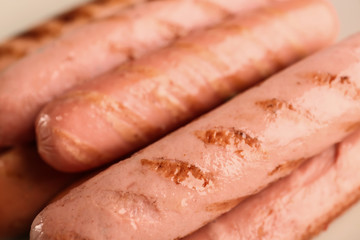 Delicious grilled sausages, closeup