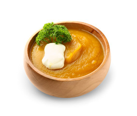 Bowl with tasty pumpkin cream soup on white background