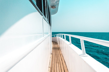 beautiful yacht or ship parts, side view of yacht sailing on the sea