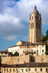 Fototapeta premium Mirador de Segovia with gothic cathedral, typical old houses, city wall. Trees, pinnacles and tower. Segovia, Spain
