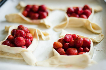 Tasty breakfast. Homemade pancakes and jam with fresh strawberry on white background