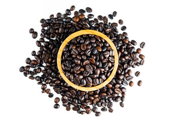 coffee beans on wooden bowl isolated top viwe on white background.