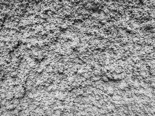 Gray plaster coat on the wall as a background