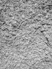 Gray plaster coat on the wall as a background