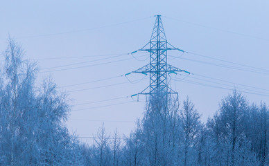 Metal electric pole in the winter in nature