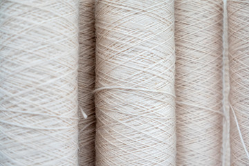 Close Up Shot Of White Yarn Bobbins