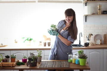 glass terrarium in hands of florist, hobby