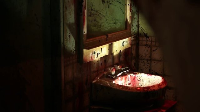Tilt Up of Blood Covered Sink and Mirror