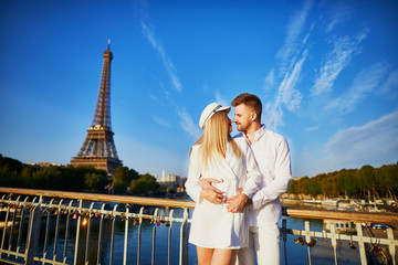 Romantic couple having a date near the Eiffel tower
