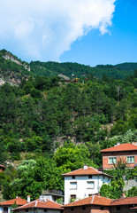 Fototapeta na wymiar rural houses on the background of the mountains
