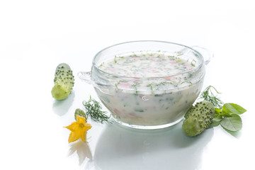 cold summer cucumber soup in a plate
