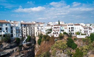 Fototapeta na wymiar White houses located next to each other in the town of Ronda in Malaga