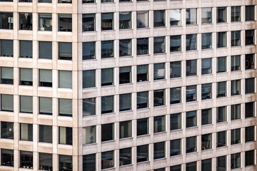 Fototapeta premium Close-up view of a high-rise building from the 1970s in a major German city.