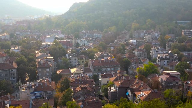 Autumn scenic view of trees and old town Plovdiv, Bulgaria