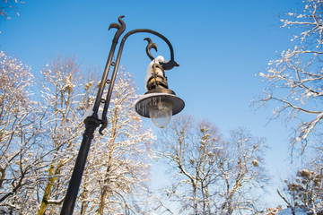 Winter in the city park, lantern.