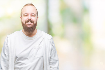 Young caucasian hipster man wearing sport clothes over isolated background with a happy and cool smile on face. Lucky person.