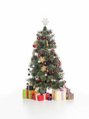 close up view of festive christmas tree and wrapped gifts isolated on white