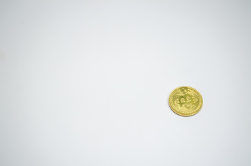 1 gold coin on white background.Do not focus on objects..