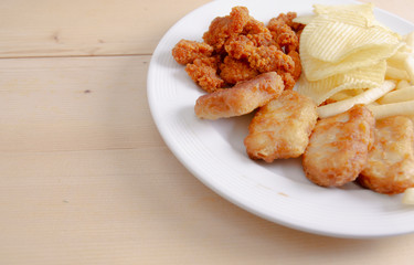 Crisps Fried food in white plate The waistline is on the table.Healthy eating and active lifestyle concept.Do not focus on objects.