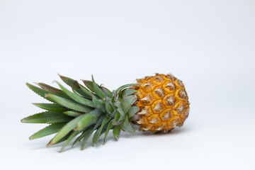 Fresh pineapple with leaves. Isolate. On white background. The view from the top