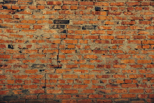 surface of an old red brick wall grunge background texture