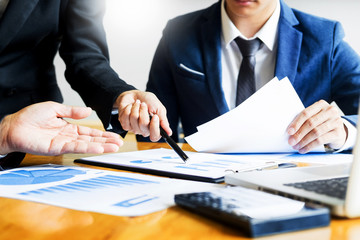 Team work process. young business managers crew working with startup project. laptop in office analyze profit graph plan