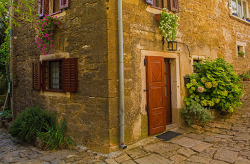 Fototapeta na wymiar A building in the hill village of Groznjan (also called Grisignana) in Istria, Croatia 