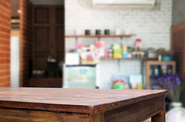 Naklejka na ściany i meble Selected focus empty brown wooden table and Coffee shop or restaurent blur background with bokeh image. for your photomontage or product display.