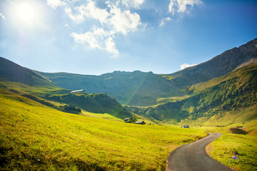 Obrazy na Plexi  Górski krajobraz z blikiem