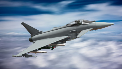 Fototapeta na wymiar armed military fighter jet flying on the speed