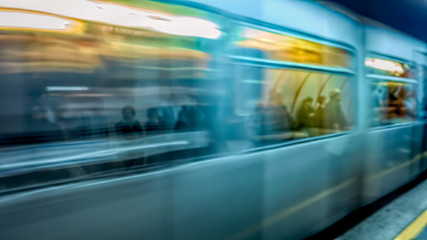 Fototapeta na wymiar subway train quickly travels along the apron