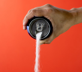 Can pouring sugar stream in calories content of soda energetic and refreshing drinks