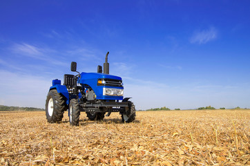 mini tractor on the field