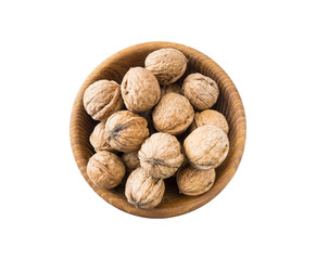 Walnuts isolated on white. Walnuts in a bowl isolated on white background. Walnuts with copy space for text on a white background