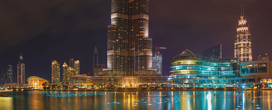 DUBAI, UAE - MARCH 24, 2017: The nightly panorama of funtain in front of Burj Khalifa.