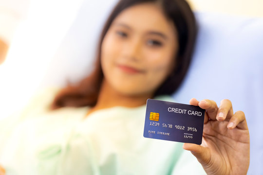 Patient with credit card for insurance concept