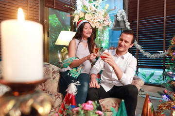 Happy group of friends celebrating and enjoying new year party together