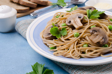 Dark pasta with mushrooms