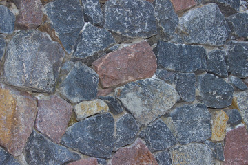 каменная стена из разноцветного гранита(текстура)