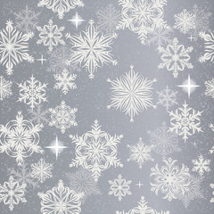 Fototapeta na wymiar Seamless vector background with snowflakes on a gray background