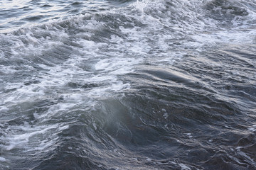 Background texture image of sea water from above copyspace design