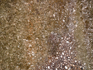 The texture of a stone fence made of granite. Background