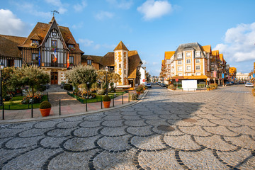 Town hall building during the morning light in Deauville, famous french town in Normandy - obrazy, fototapety, plakaty