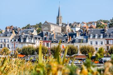 Landscape view on the riverside of Trouville village with church tower in the famous french resort in Normandy