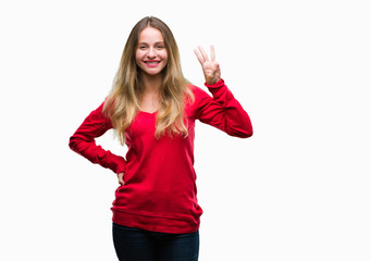 Young beautiful blonde woman wearing red sweater over isolated background showing and pointing up with fingers number three while smiling confident and happy.