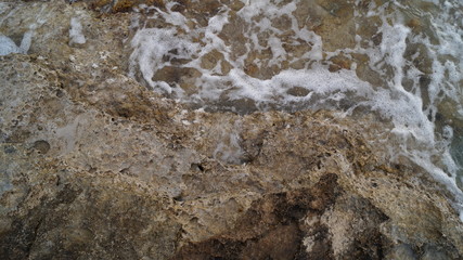Waves over rocks