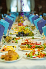 delicious dishes on the table in the restaurant. serving table.