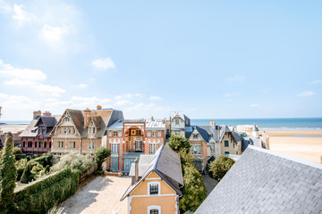 Fototapeta na wymiar Rooftops of the luxury houses near the beach in Trouville, famous french resort in Normandy