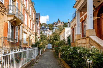 Fototapeta na wymiar Street view with luxury buildings in the center of the old town of Trouville, famous french town in Normandy
