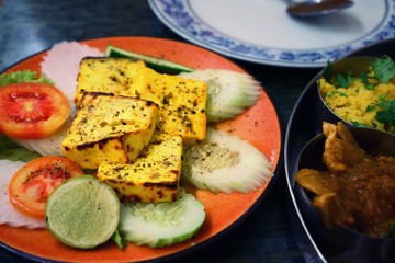 Cheese grill as traditional authentic Indian food at a restaurant